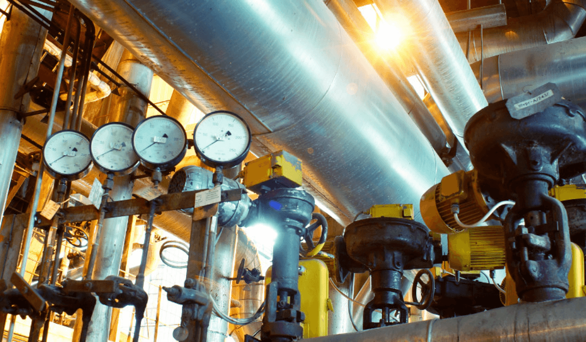 Energy solutions engineer working on equipment