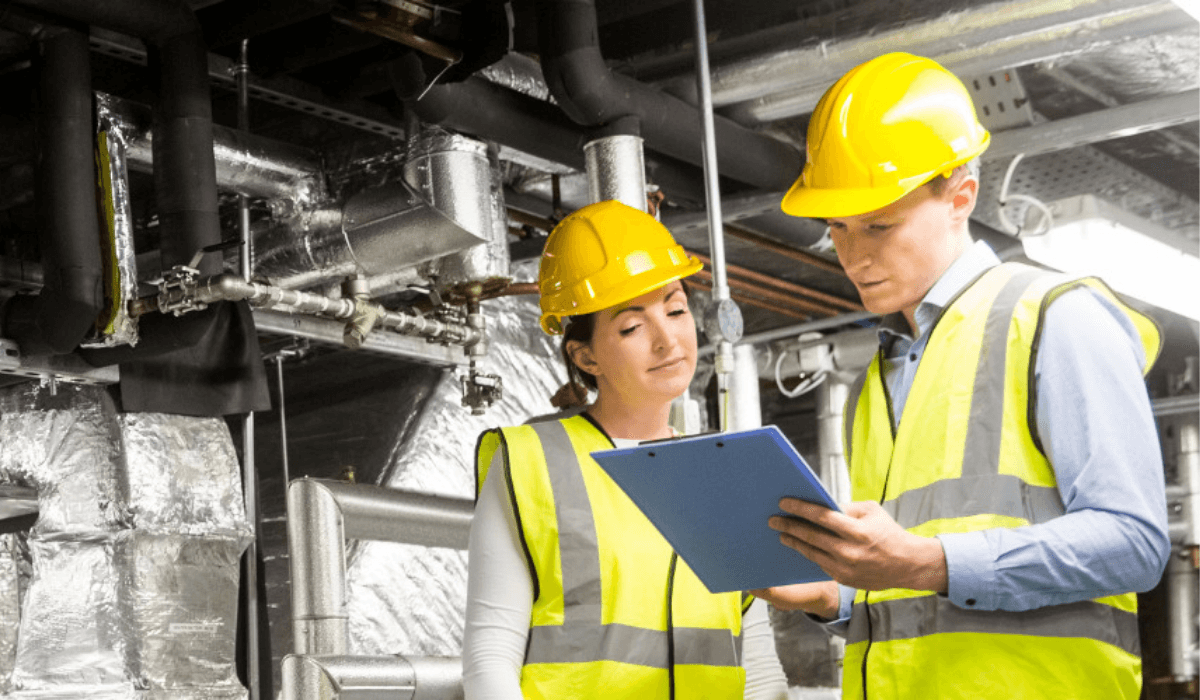 Optimization solutions engineer working on equipment
